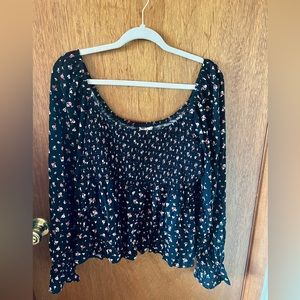 Black floral peplum top